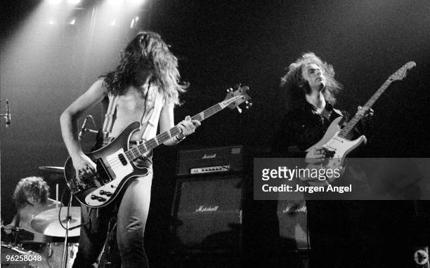 Ian Paice, Glenn Hughes and Ritchie Blackmore of Deep Purple perform on stage at KB Hallen on December 9th 1973 in Copenhagen, Denmark.