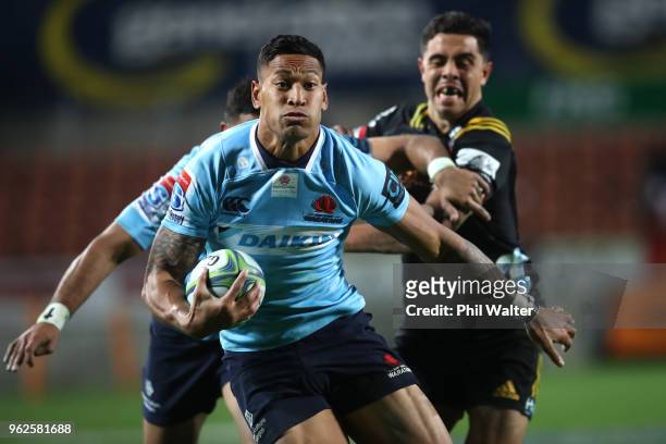 Israel Folau of the Waratahs makes a break during the round 15 Super Rugby match between the Chiefs and the Waratahs at FMG Stadium on May 26, 2018...