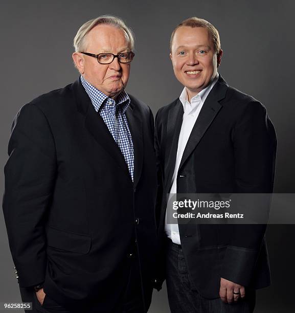 Martti Ahtisaari of CMI with his son Marko Ahtisaari of Nokia pose during a portrait session at the Digital Life Design conference at HVB Forum on...