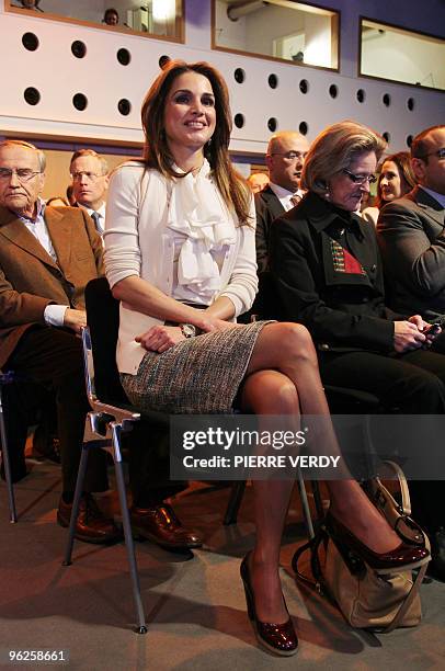 Queen Rania of Jordan listens as her husband King Abdullah II talks during a conversation focusing on the global agenda in 2010 from the perspective...