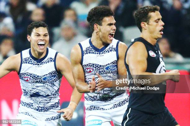Debutant Jamaine Jones of the Cats celebrates a goal during the round 10 AFL match between the Geelong Cats and the Carlton Blues at GMHBA Stadium on...