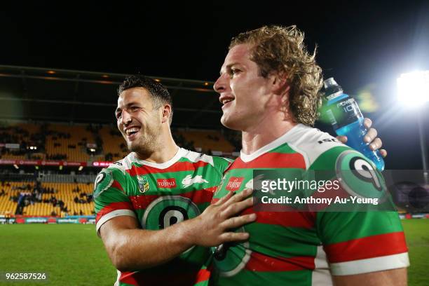 Sam Burgess of the Rabbitohs shares a laugh with his younger brother George Burgess after winning the round 12 NRL match between the New Zealand...