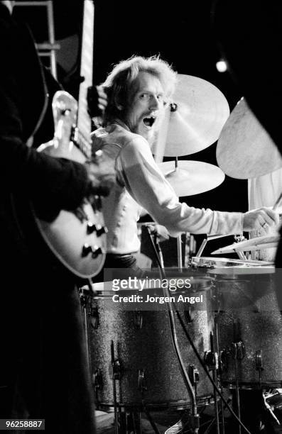 Ginger Baker performs on stage in Central Park in 1972 in New York City.