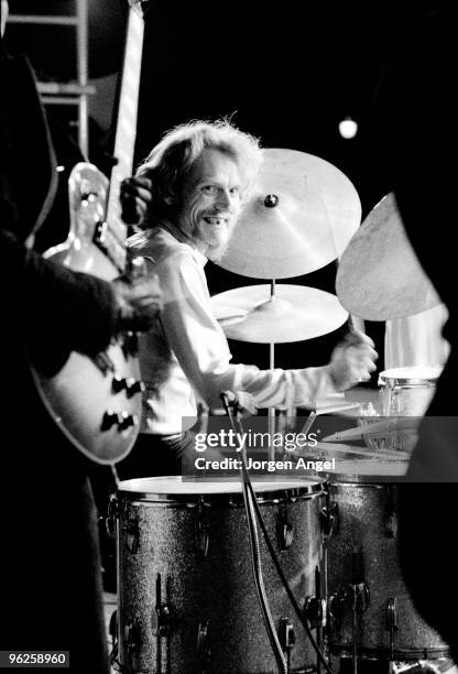 Ginger Baker performs on stage in Central Park in 1972 in New York City.