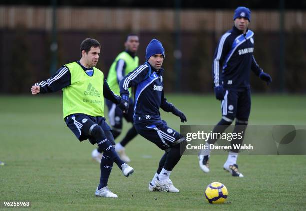 Joe Cole and Deco of Chelsea during a training session at the Cobham Training Ground on January 29, 2010 in Cobham, England.