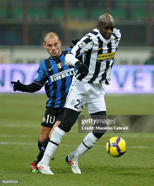 Wesley Sneijder of FC Inter Milan battles for the ball against Mohamed Lamine Sissoko of Juventus FC during the Tim Cup match between FC Inter Milan...