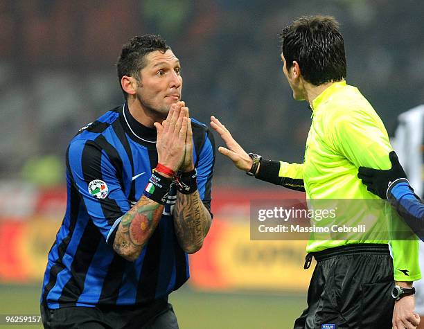 Marco Materazzi of FC Inter Milan reacts talking with the referee Antonio Damato during the Tim Cup match between FC Inter Milan and Juventus FC at...