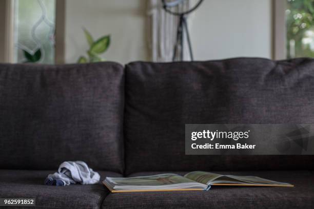 family couch - emma baker stock pictures, royalty-free photos & images
