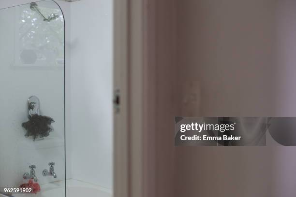 shower - emma baker stock pictures, royalty-free photos & images