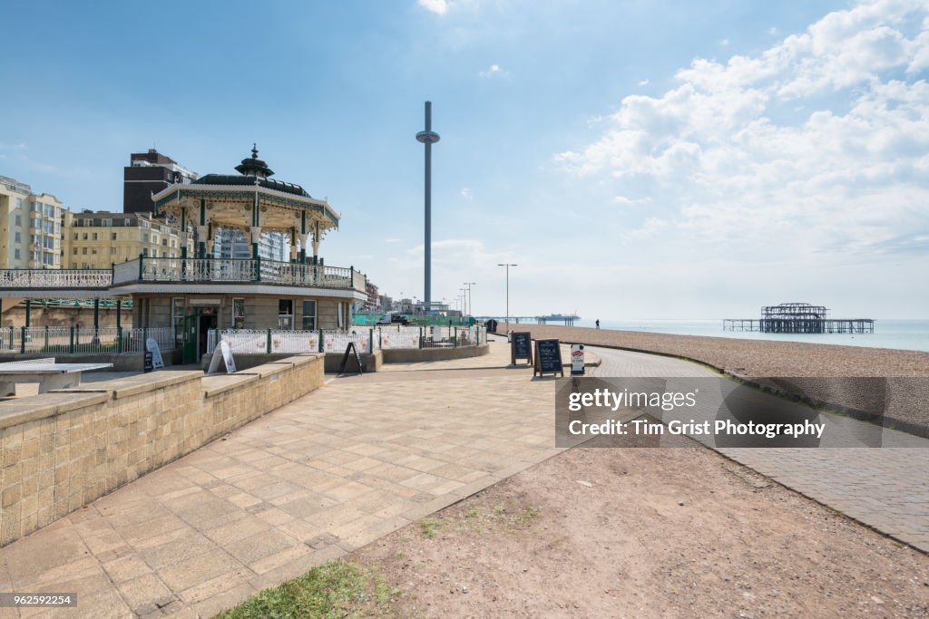 View of the Bandstand on the Promenade towards Brighton Palace Pier and i360 Tower.