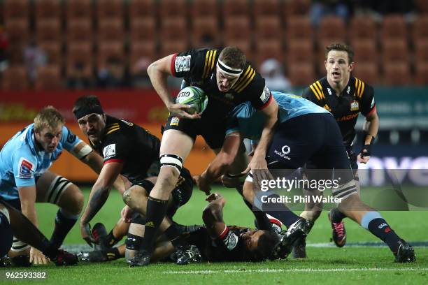 Brodie Retallick of the Chiefs is tackled during the round 15 Super Rugby match between the Chiefs and the Waratahs at FMG Stadium on May 26, 2018 in...