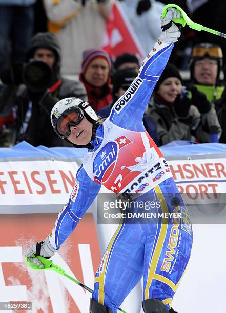 Sweden's Anja Paerson celebrates as she wins the FIS alpine ski world cup super combined on January 29, 2010 in Saint Moritz. Sweden's Anja Paerson...