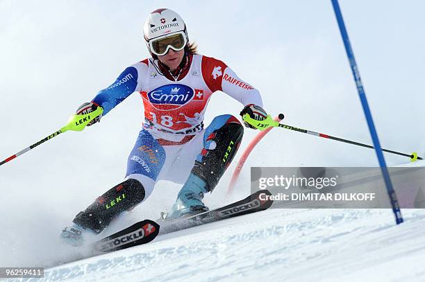 Fabienne Suter of Switzerland clears a gate during the slalom event of the Women's super combined at the FIS Alpine Skiing World Cup in Saint Moritz...