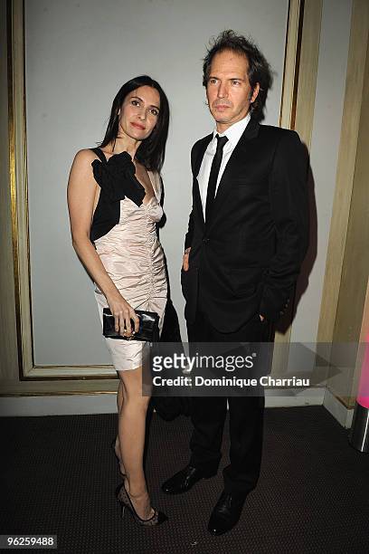 Geraldine Pailhas and Christopher Thompson attend Fashion Dinner for AIDS at Pavillon d'Armenonville on January 28, 2010 in Paris, France.