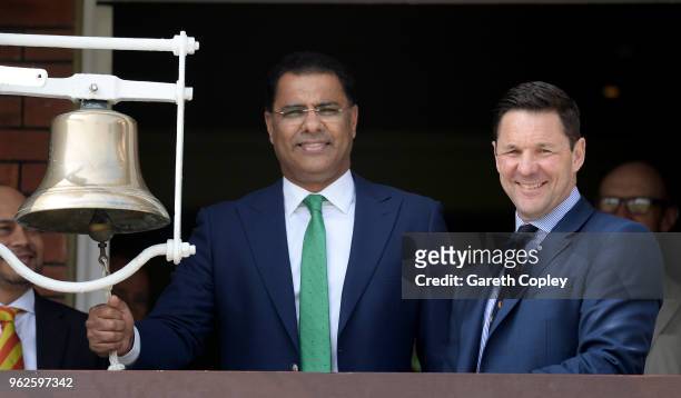Former Pakistan fast bowler Waqar Younis rings the five minute bell alongside MCC Chief Executive Guy Lavender ahead of day three of the 1st NatWest...