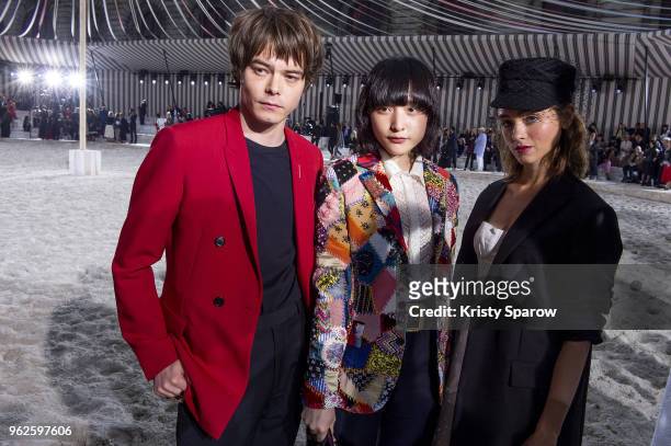 Charlie Heaton, Hanna Chan and Natalia Dyer attend the Christian Dior Couture S/S19 Cruise Collection on May 25, 2018 in Chantilly, France.