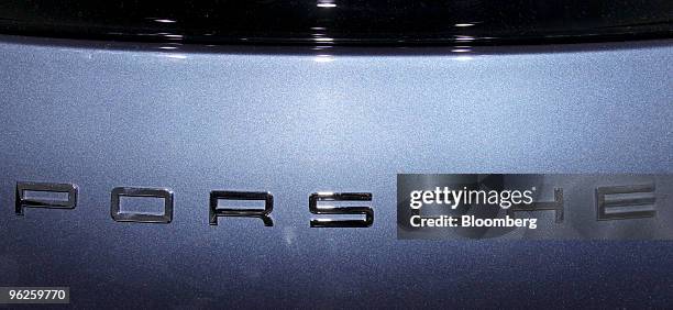 The Porsche SE logo is seen on a Porsche Panamera 4 S automobile at the company's annual shareholders' meeting, in Stuttgart, Germany, on Friday,...