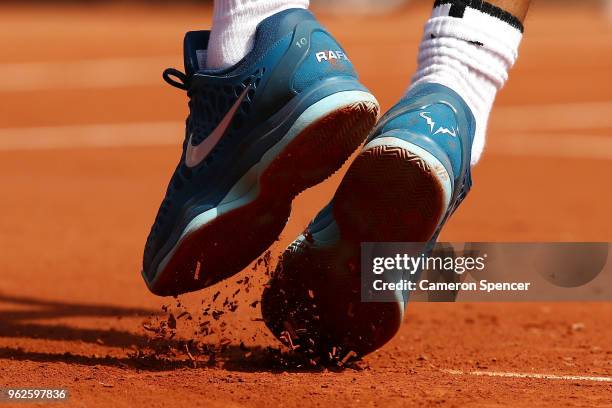 Rafael Nadal of Spain serves during a practice session ahead of the French Open at Roland Garros on May 26, 2018 in Paris, France.