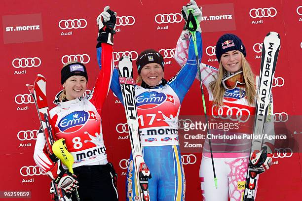 Anja Paerson of Sweden takes 1st place, Michaela Kirchgasser of Austria takes 2nd place, Lindsey Vonn of the USA takes 3rd place during the Audi FIS...
