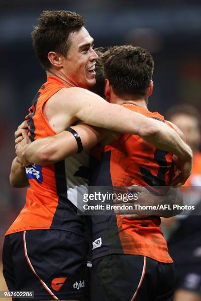 Stephen Coniglio of the Giants celebrates kicking a goal with team mate Jeremy Cameron of the Giants during the round 10 AFL match between the...
