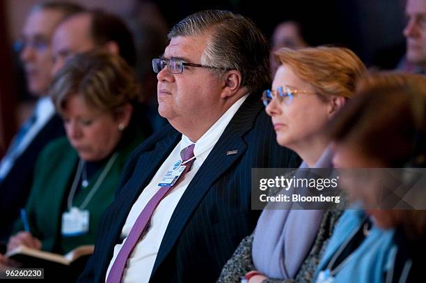 Agustin Carstens, governor of the central bank of Mexico, center, attends a plenary session titled "From Copenhagen to Mexico: What's Next?" on day...