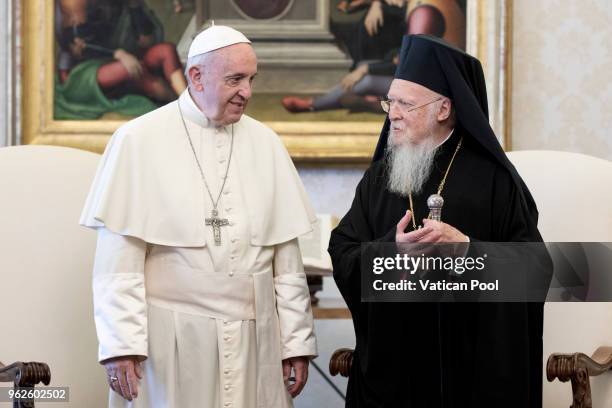 Pope Francis meets ecumenical Patriarch Bartholomew I of Constantinople during an audience at the Apostolic Palace on May 26, 2018 in Vatican City,...