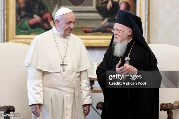 Pope Francis meets ecumenical Patriarch Bartholomew I of Constantinople during an audience at the Apostolic Palace on May 26, 2018 in Vatican City,...