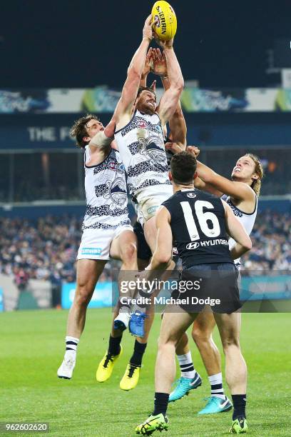Patrick Dangerfield of the Cats marks the ball during the round 10 AFL match between the Geelong Cats and the Carlton Blues at GMHBA Stadium on May...