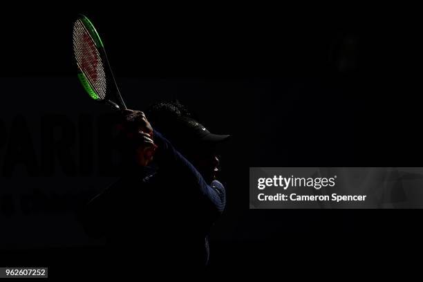 Serena Williams of the United States plays a backhand during a practice session ahead of the French Open at Roland Garros on May 26, 2018 in Paris,...