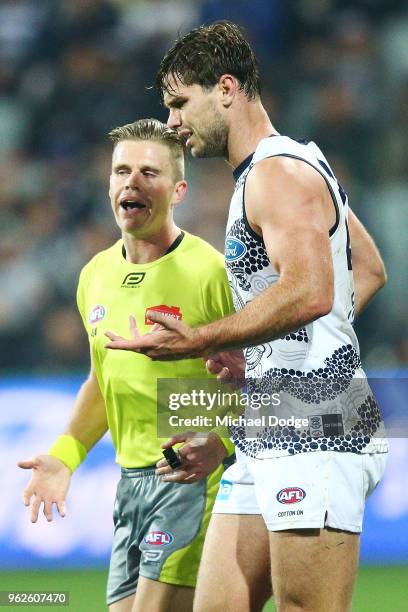 Tom Hawkins of the Cats argues with the umpire during the round 10 AFL match between the Geelong Cats and the Carlton Blues at GMHBA Stadium on May...