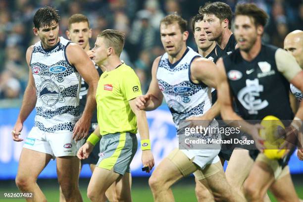 Tom Hawkins of the Cats argues with the umpire during the round 10 AFL match between the Geelong Cats and the Carlton Blues at GMHBA Stadium on May...