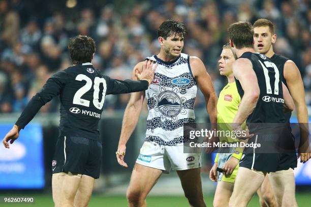 Tom Hawkins of the Cats argues with the umpire during the round 10 AFL match between the Geelong Cats and the Carlton Blues at GMHBA Stadium on May...