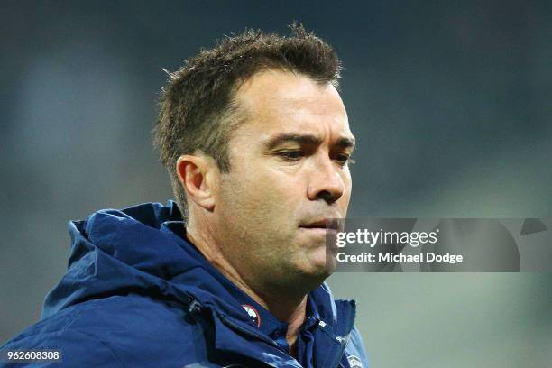 Cats head coach Chris Scott runs off during the round 10 AFL match between the Geelong Cats and the Carlton Blues at GMHBA Stadium on May 26, 2018 in...