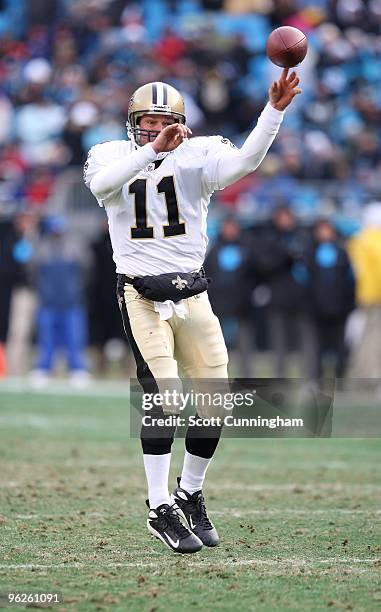 Mark Brunell of the New Orleans Saints passesagainst the Carolina Panthers at Bank of America Stadium on January 3, 2010 in Charlotte, North...