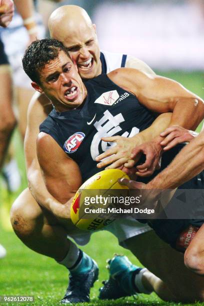 Gary Ablett of the Cats tackles Ed Curnow of the Blues during the round 10 AFL match between the Geelong Cats and the Carlton Blues at GMHBA Stadium...