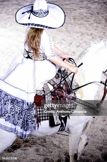 Horsewoman is seen on the runway during Christian Dior Couture S/S19 Cruise Collection show on May 25, 2018 in Chantilly, France.