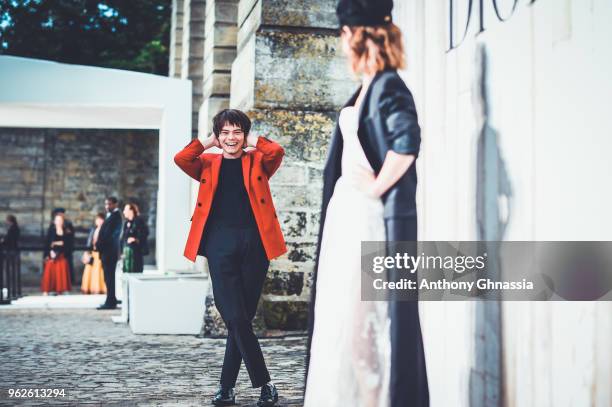 Charlie Heaton and Natalia Dyer attend a photocall during Christian Dior Couture S/S19 Cruise Collection on May 25, 2018 in Chantilly, France.