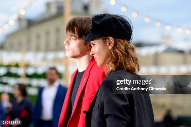 Charlie Heaton and Natalia Dyer attend a photocall during Christian Dior Couture S/S19 Cruise Collection on May 25, 2018 in Chantilly, France.