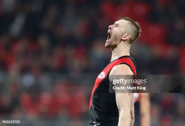 Shaun McKernan of the Bombers celebrates a goal during the round 10 AFL match between the Greater Western Sydney Giants and the Essendon Bombers at...