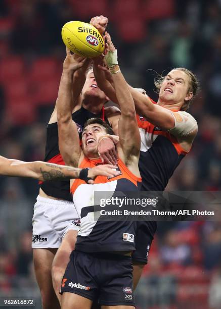 Zac Langdon of the Giants attempts to grab a mark with the pack during the round 10 AFL match between the Greater Western Sydney Giants and the...