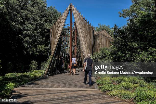 Visitors enter a chapel at Santa Sede at Isola di San Giorgio Maggiore during the press preview at the 16th. International Architecture Biennale on...