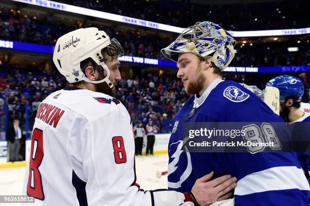 Alex Ovechkin of the Washington Capitals talks with Andrei Vasilevskiy of the Tampa Bay Lightning after Game Seven of the Eastern Conference Finals...