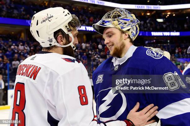 Alex Ovechkin of the Washington Capitals talks with Andrei Vasilevskiy of the Tampa Bay Lightning after Game Seven of the Eastern Conference Finals...