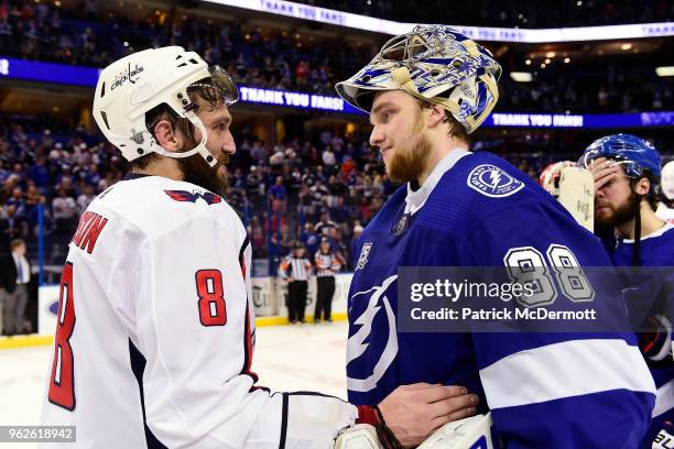 Alex Ovechkin of the Washington Capitals talks with Andrei Vasilevskiy of the Tampa Bay Lightning after Game Seven of the Eastern Conference Finals...