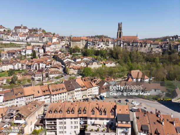 aerial view of fribourg medieval old town with its famous cathedral in switzerland - fribourg canton stock pictures, royalty-free photos & images