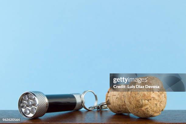 cava cork keyring holding flashlight - bottle stopper stock pictures, royalty-free photos & images