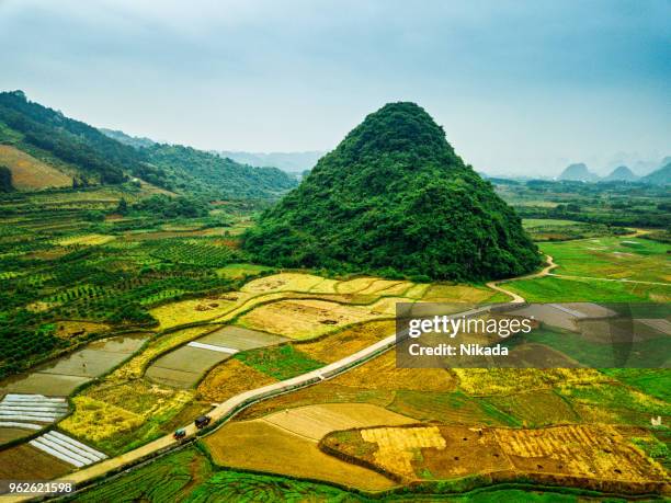 aerial view of karst mountains and rice fields near guilin, yangshuo - xingping stock pictures, royalty-free photos & images