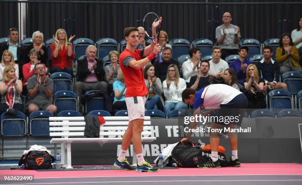 Joe Salisbury of Great Britain and Frederik Nielsen of Denmark applaud the fans after winning their Semi Final match against Robert Galloway and...
