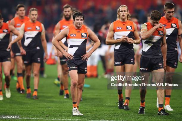 Giants players leave the field during the round 10 AFL match between the Greater Western Sydney Giants and the Essendon Bombers at Spotless Stadium...