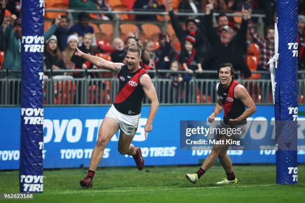 Jake Stringer of the Bombers celebrates a goal during the round 10 AFL match between the Greater Western Sydney Giants and the Essendon Bombers at...